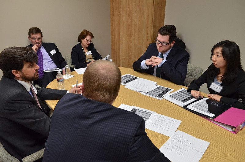 Law students negotiating during the National Transactional LawMeet.